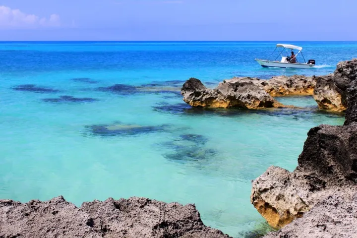 a rocky beach next to the ocean