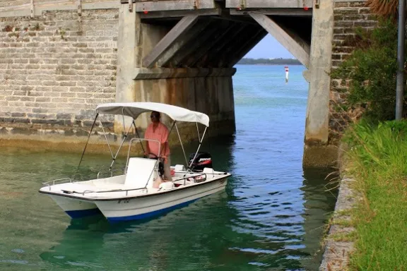 a small boat in a body of water