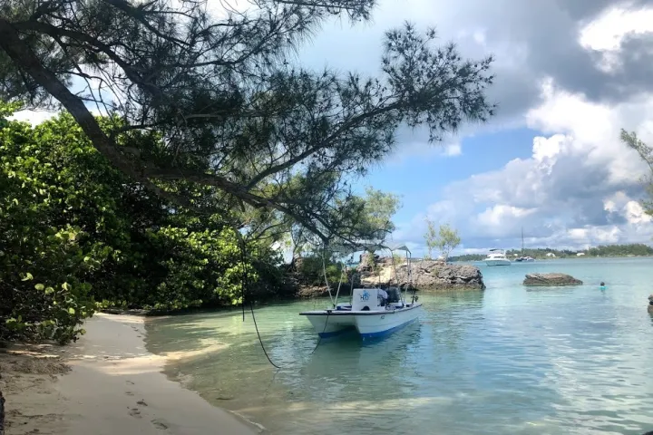 a small boat in a body of water