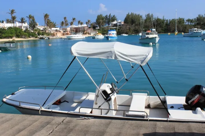 a small boat in a body of water