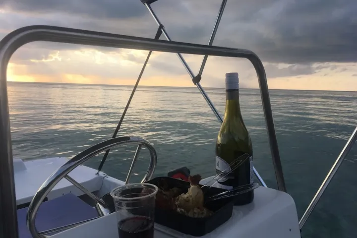 a view of a boat next to a body of water