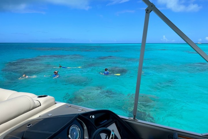a boat parked next to a body of water
